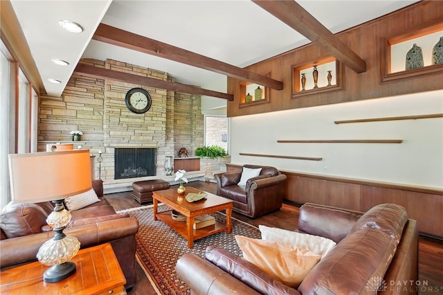 450 Ridgewood Ave, Oakwood, OH 45409 - living area with beamed ceiling, wood finished floors, wooden walls, a stone fireplace, and wainscoting