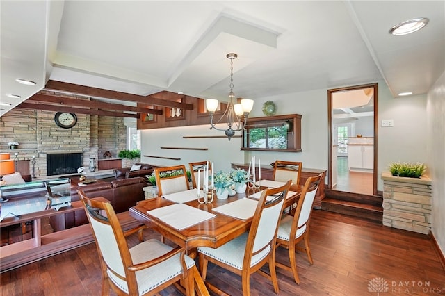450 Ridgewood Ave, Oakwood, OH 45409 - dining space featuring a chandelier, wood finished floors, and a fireplace