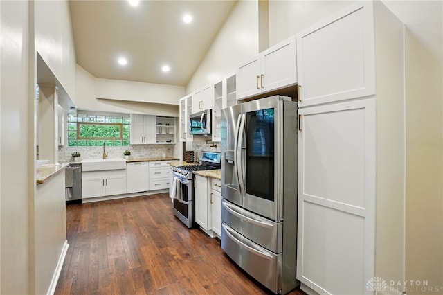 450 Ridgewood Ave, Oakwood, OH 45409 - kitchen with appliances with stainless steel finishes, dark wood finished floors, white cabinets, a sink, and decorative backsplash