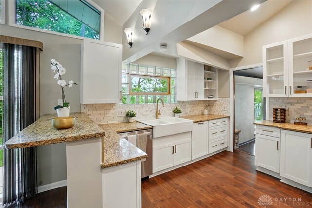 450 Ridgewood Ave, Oakwood, OH 45409 - kitchen with a peninsula, dishwasher, open shelves, a sink, and tasteful backsplash
