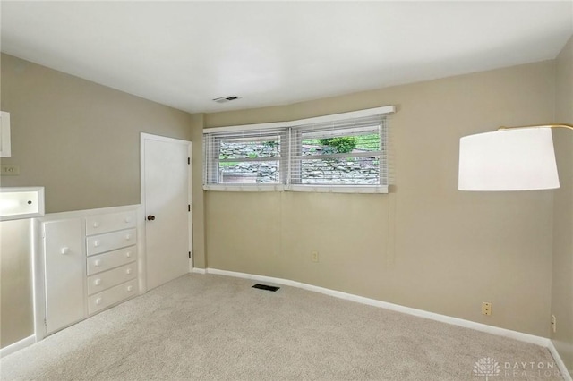 450 Ridgewood Ave, Oakwood, OH 45409 - unfurnished bedroom with carpet flooring and baseboards