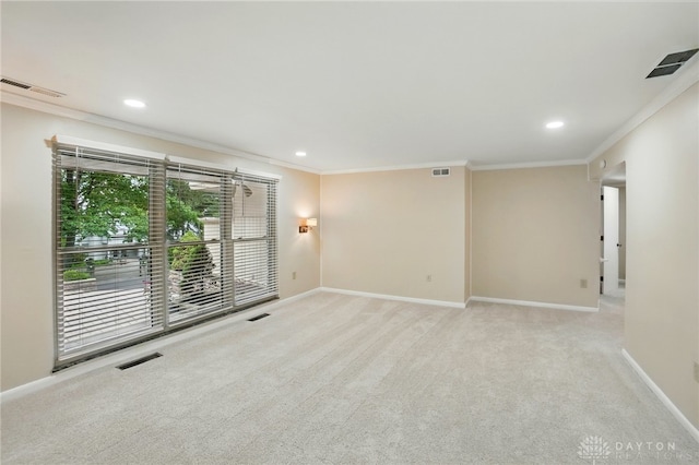 450 Ridgewood Ave, Oakwood, OH 45409 - carpeted empty room with crown molding, baseboards, and recessed lighting