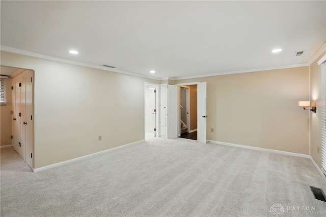 450 Ridgewood Ave, Oakwood, OH 45409 - carpeted empty room with crown molding, recessed lighting, baseboards, and stairway
