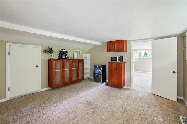 450 Ridgewood Ave, Oakwood, OH 45409 - unfurnished living room featuring light carpet and baseboards