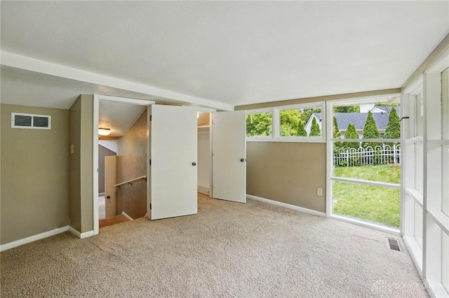 450 Ridgewood Ave, Oakwood, OH 45409 - unfurnished bedroom with carpet floors, baseboards, and connected bathroom