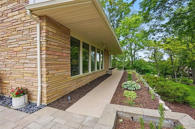 450 Ridgewood Ave, Oakwood, OH 45409 - view of side of home featuring stone siding and brick siding