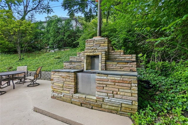 450 Ridgewood Ave, Oakwood, OH 45409 - view of patio with an outdoor stone fireplace and outdoor dining area
