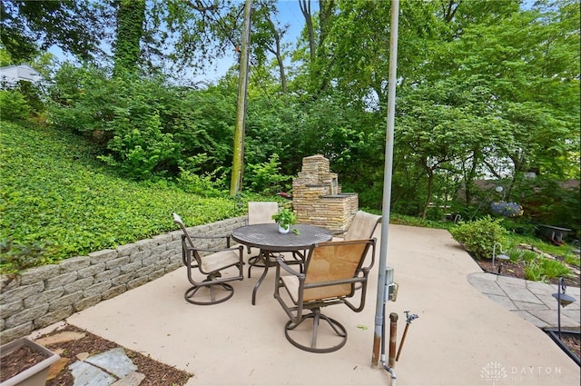 450 Ridgewood Ave, Oakwood, OH 45409 - view of patio with an outdoor stone fireplace and outdoor dining area