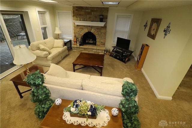 9543 Hacker Farm Ln, Centerville, OH 45458 - living area with carpet, a fireplace, baseboards, and a paneled ceiling