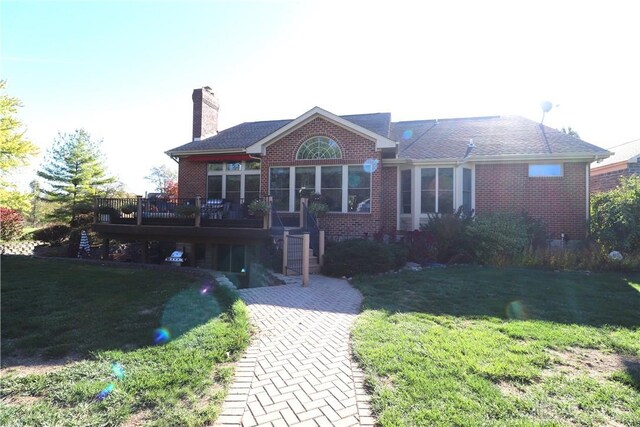 9543 Hacker Farm Ln, Centerville, OH 45458 - back of house with brick siding, a yard, a wooden deck, and a chimney
