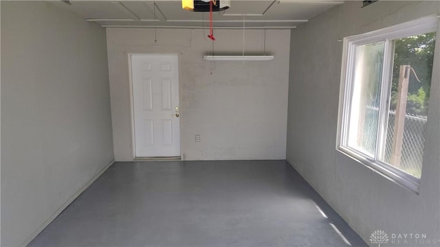 413 W Lake Ave, New Carlisle, OH 45344 - garage with a garage door opener