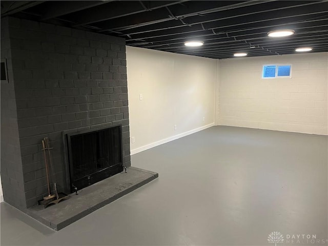 8700 Adams Rd, Dayton, OH 45424 - finished basement featuring a brick fireplace