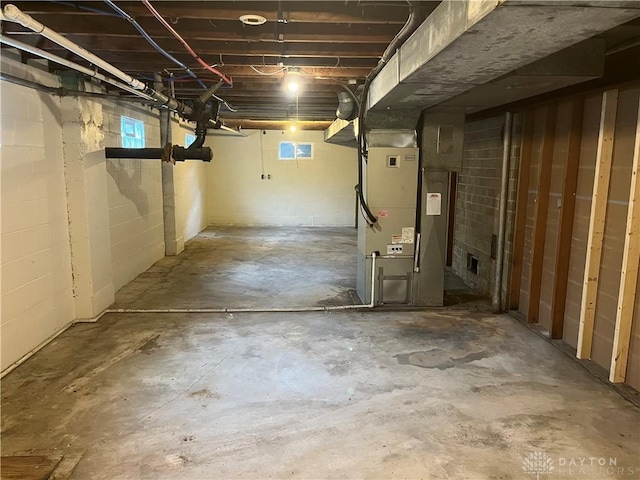 8700 Adams Rd, Dayton, OH 45424 - basement with concrete block wall and heating unit