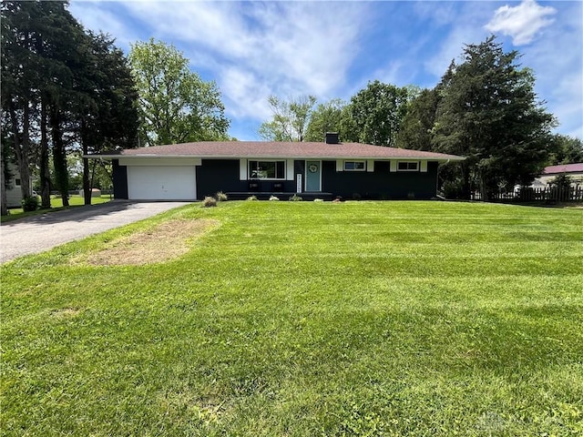 8700 Adams Rd, Dayton, OH 45424 - ranch-style house with asphalt driveway, an attached garage, and a front yard
