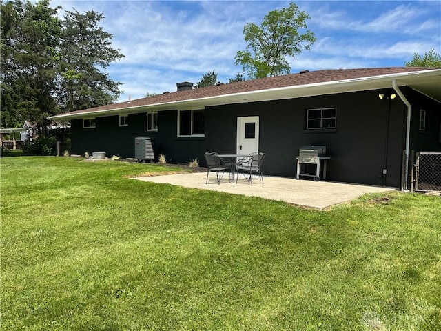 8700 Adams Rd, Dayton, OH 45424 - rear view of property featuring a patio and a lawn