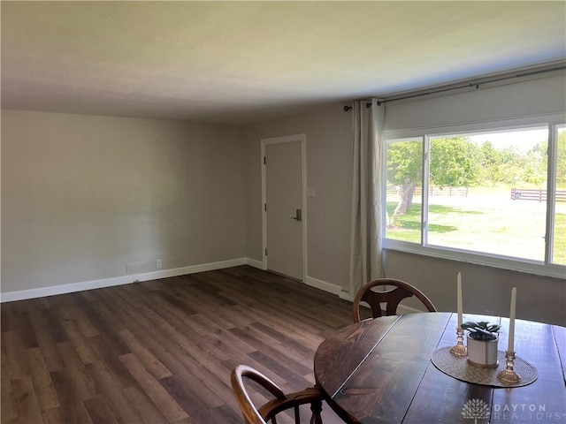 8700 Adams Rd, Dayton, OH 45424 - dining area with dark wood finished floors and baseboards