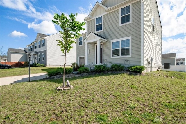 1852 Amelia Way, Dayton, OH 45439 - view of front of house featuring board and batten siding and central AC