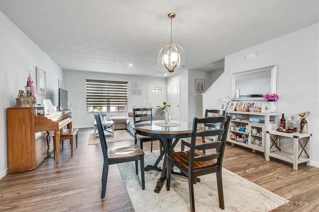 1852 Amelia Way, Dayton, OH 45439 - dining area featuring baseboards, a chandelier, wood finished floors, and recessed lighting