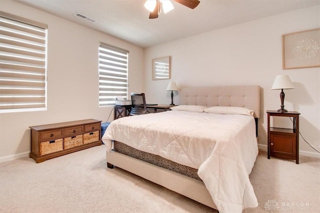1852 Amelia Way, Dayton, OH 45439 - bedroom with light colored carpet, baseboards, and a ceiling fan