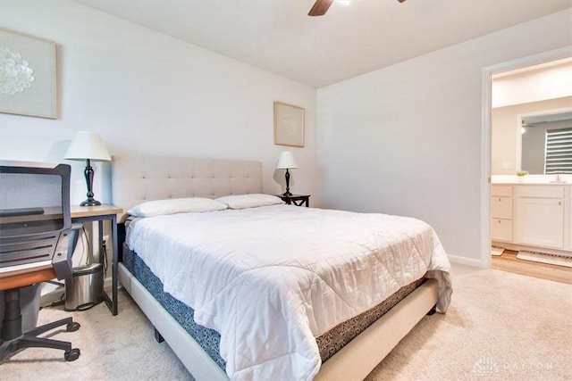 1852 Amelia Way, Dayton, OH 45439 - bedroom with light colored carpet, ensuite bath, and ceiling fan