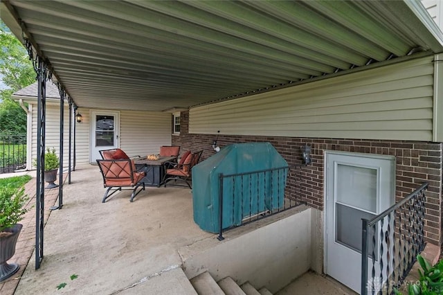 5135 Lamonte Dr, Fairfield, OH 45014 - view of patio with an outdoor fire pit and a grill