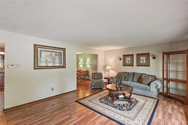 5135 Lamonte Dr, Fairfield, OH 45014 - living area with wood finished floors and baseboards