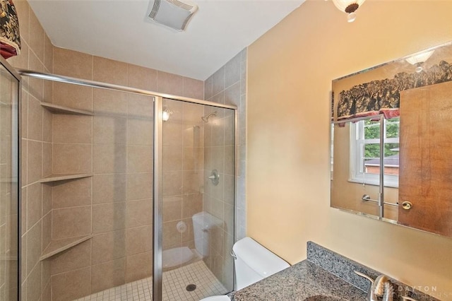 5135 Lamonte Dr, Fairfield, OH 45014 - bathroom with toilet, vanity, and a shower stall