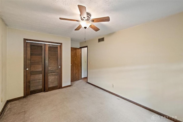 5135 Lamonte Dr, Fairfield, OH 45014 - unfurnished bedroom featuring a closet, baseboards, light carpet, and a ceiling fan
