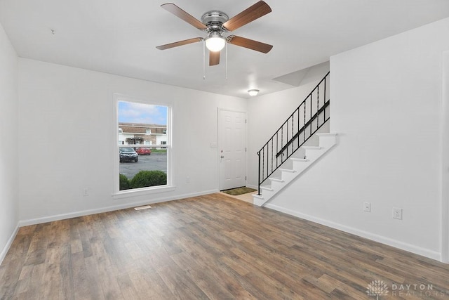 1050 Frederick Dr, Xenia, OH 45385 - entryway with stairs, baseboards, wood finished floors, and a ceiling fan