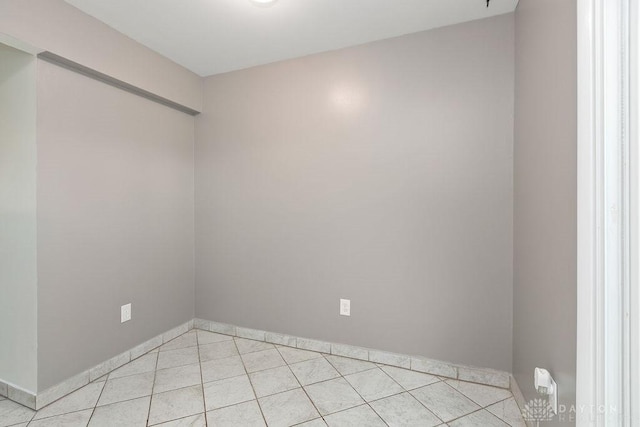 1050 Frederick Dr, Xenia, OH 45385 - empty room featuring baseboards and light tile patterned floors