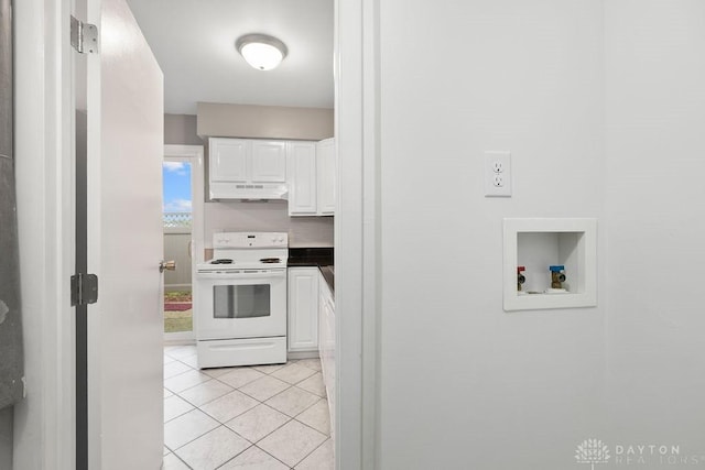 1050 Frederick Dr, Xenia, OH 45385 - kitchen featuring electric range, under cabinet range hood, white cabinets, and light tile patterned floors