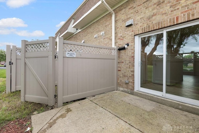 1050 Frederick Dr, Xenia, OH 45385 - view of patio / terrace featuring a gate
