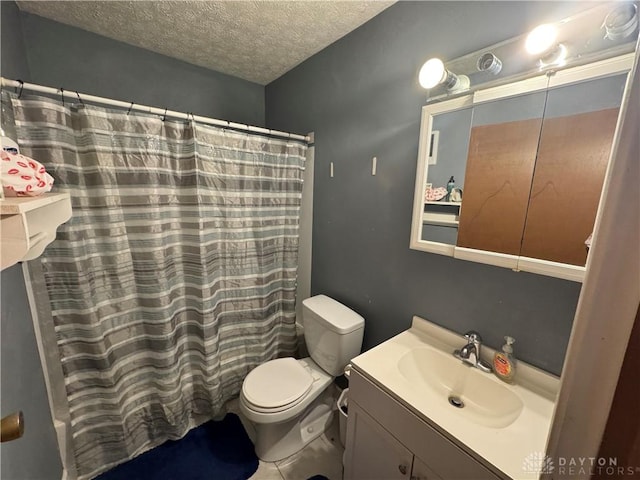 326 Little League Dr, Eaton, OH 45320 - full bath featuring a textured ceiling, toilet, and vanity