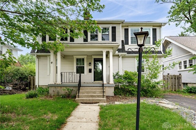 1809 Shroyer Rd, Oakwood, OH 45419 - view of front of house with a porch and a chimney