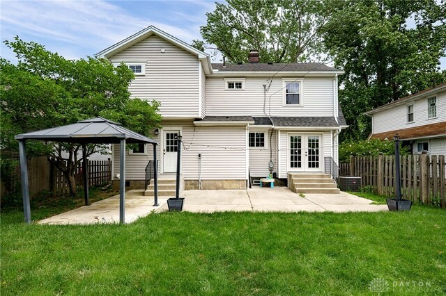 1809 Shroyer Rd, Oakwood, OH 45419 - rear view of property with french doors, entry steps, a gazebo, a patio, and a chimney