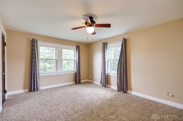 1809 Shroyer Rd, Oakwood, OH 45419 - unfurnished room with plenty of natural light, ceiling fan, and carpet floors