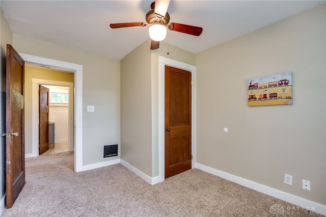 1809 Shroyer Rd, Oakwood, OH 45419 - unfurnished bedroom with light colored carpet and ceiling fan