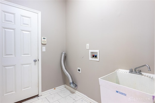 6265 Amberley Ct, Liberty Twp, OH 45044 - washroom featuring hookup for an electric dryer, baseboards, washer hookup, and light marble finish flooring