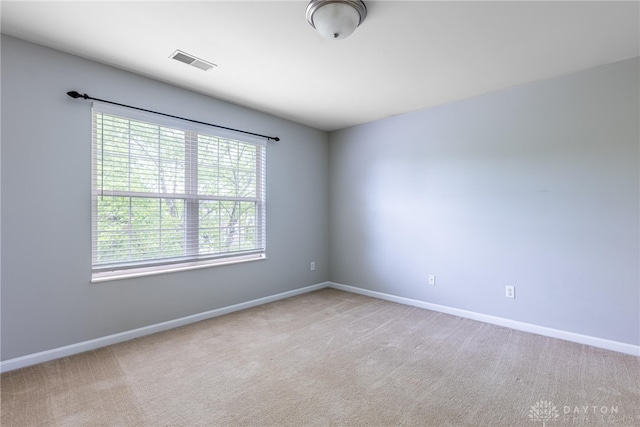6265 Amberley Ct, Liberty Twp, OH 45044 - empty room featuring baseboards and light colored carpet