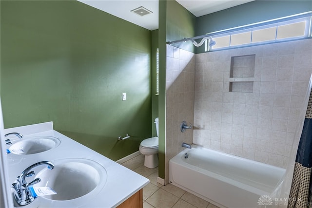 6265 Amberley Ct, Liberty Twp, OH 45044 - bathroom with tile patterned floors, shower / bath combo with shower curtain, double vanity, toilet, and baseboards