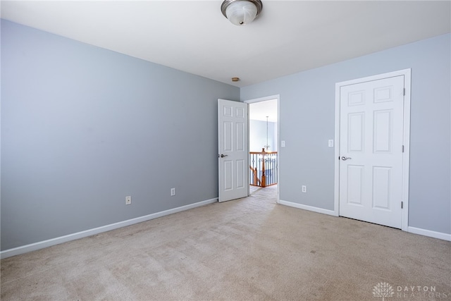 6265 Amberley Ct, Liberty Twp, OH 45044 - unfurnished bedroom with carpet and baseboards