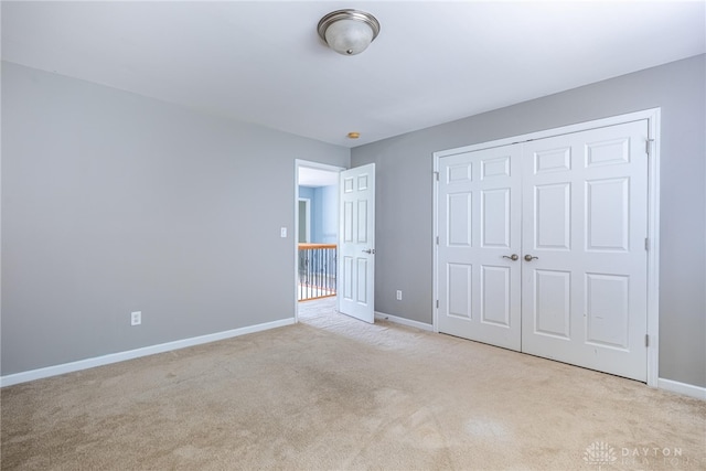 6265 Amberley Ct, Liberty Twp, OH 45044 - unfurnished bedroom featuring carpet floors, baseboards, and a closet