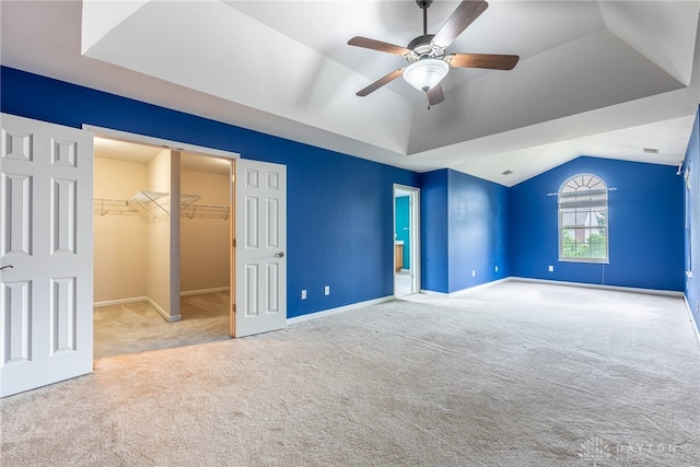 6265 Amberley Ct, Liberty Twp, OH 45044 - unfurnished bedroom featuring carpet, lofted ceiling, baseboards, a spacious closet, and a ceiling fan