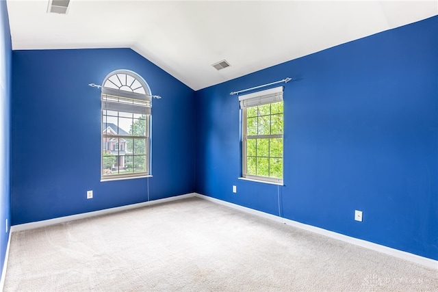 6265 Amberley Ct, Liberty Twp, OH 45044 - empty room with vaulted ceiling, carpet flooring, and baseboards