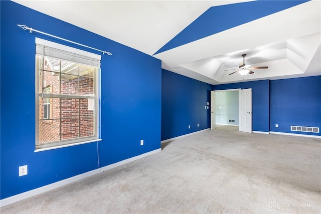 6265 Amberley Ct, Liberty Twp, OH 45044 - carpeted empty room with a raised ceiling, baseboards, a ceiling fan, and vaulted ceiling