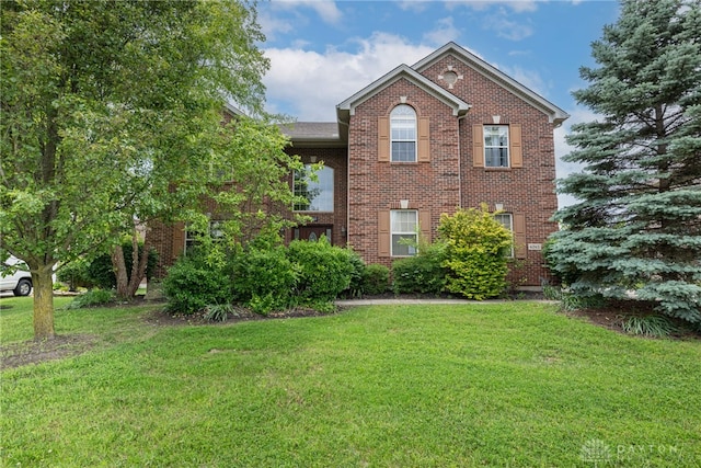 6265 Amberley Ct, Liberty Twp, OH 45044 - view of front facade with a front yard and brick siding