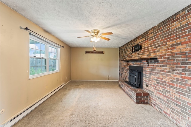668 Dakota Dr, Xenia, OH 45385 - unfurnished living room with baseboard heating, a wood stove, a textured ceiling, carpet floors, and a ceiling fan