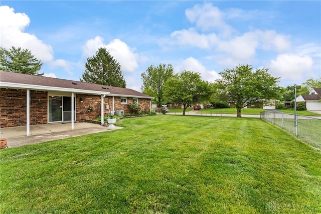 668 Dakota Dr, Xenia, OH 45385 - view of yard featuring a patio