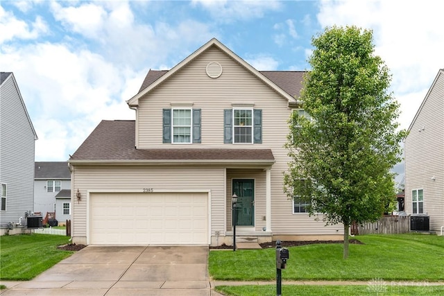 2385 Gerard Ct, Fairborn, OH 45324 - traditional-style house featuring concrete driveway, central air condition unit, and a shingled roof