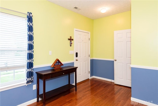 2385 Gerard Ct, Fairborn, OH 45324 - hallway featuring dark wood-style flooring and baseboards